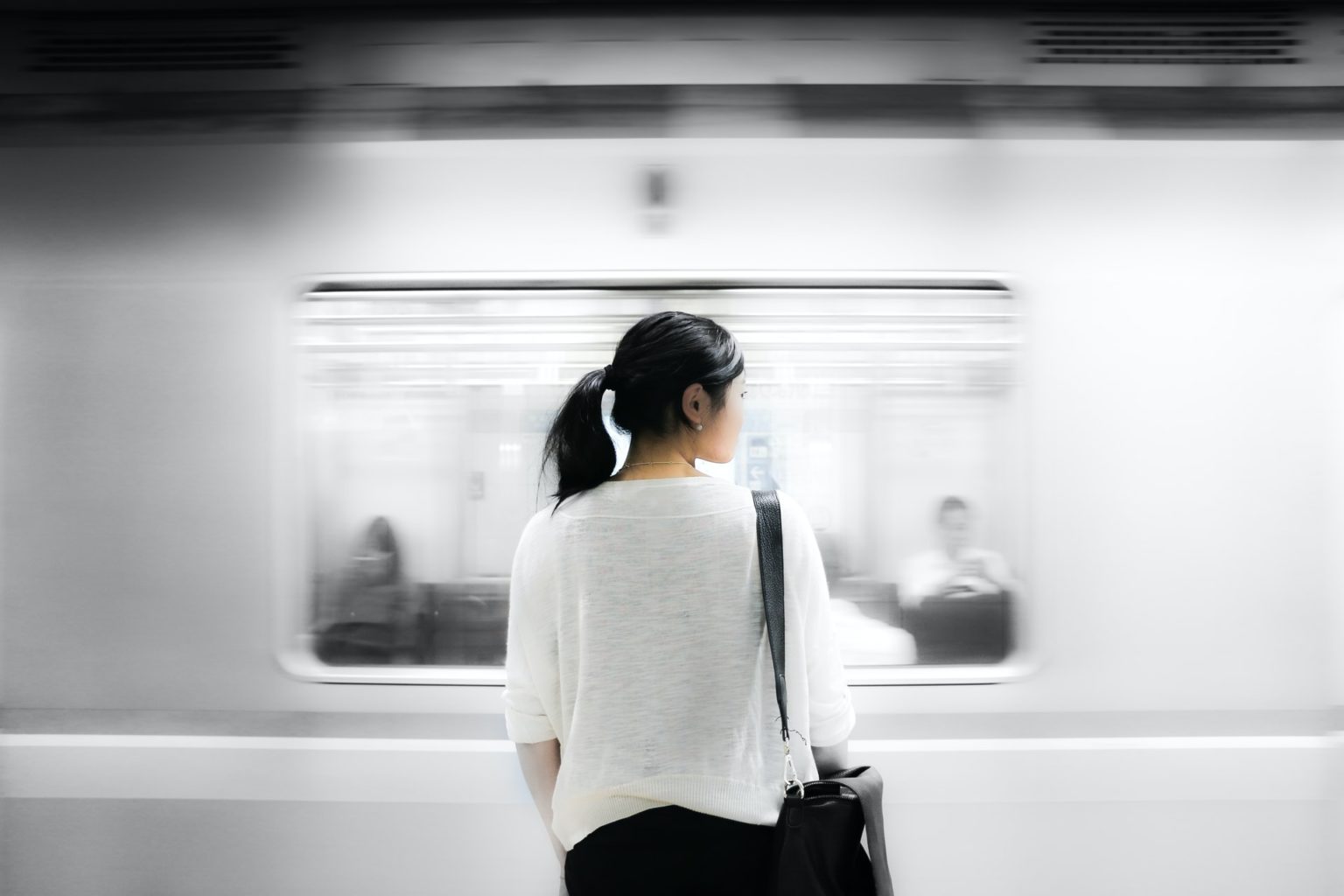 a person looking out a window