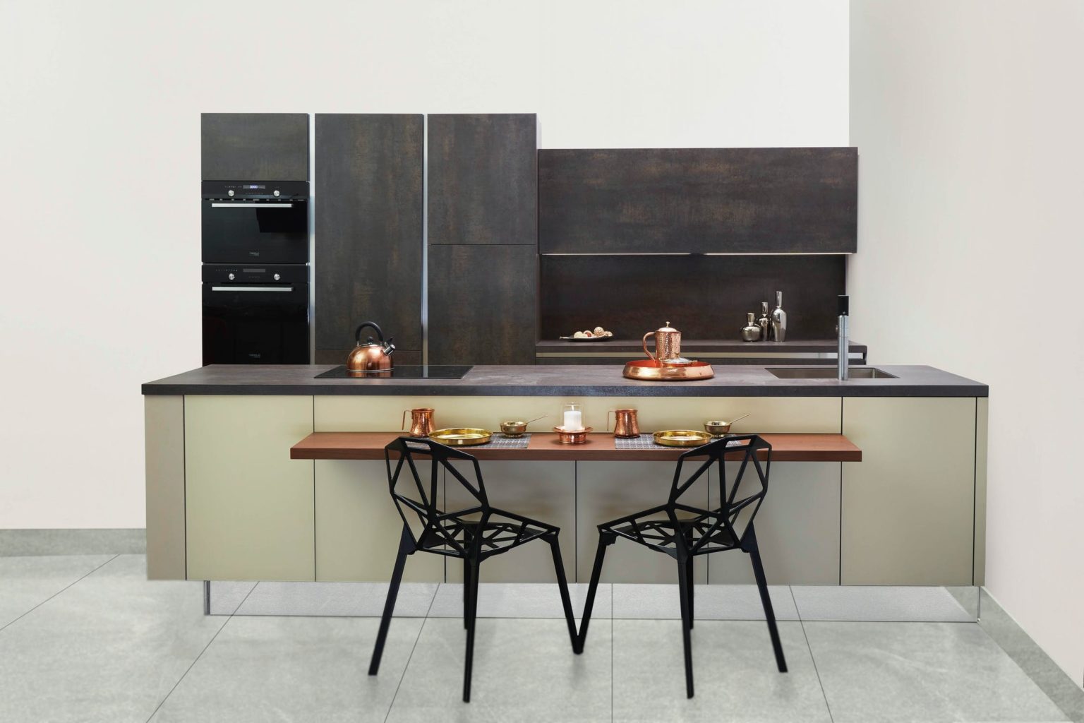 a kitchen with a table and chairs