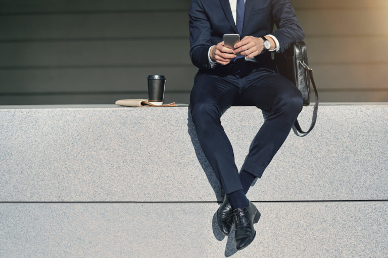 a person sitting on a bench